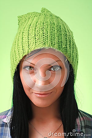 Young lady in green woollen cap Stock Photo