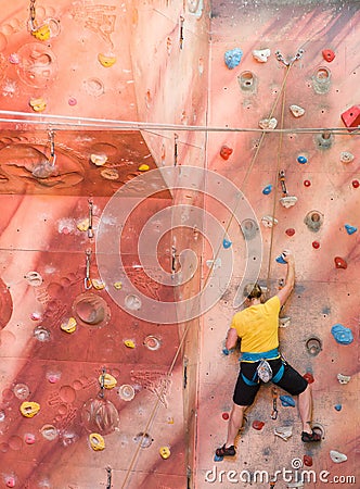 Young lady rock climbing Editorial Stock Photo