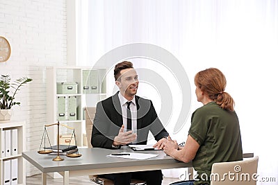 Young lawyer having meeting with senior client Stock Photo