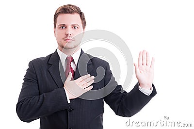 Young lawyer making oath or swearing gesture Stock Photo