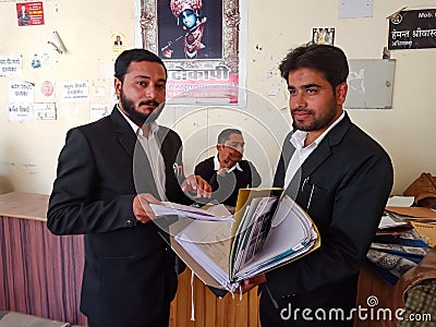 young lawyers working at court area wearing black uniform in India January 2020 Editorial Stock Photo