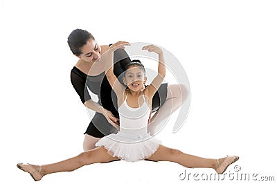 Young little girl ballerina learning dance lesson with ballet teacher Stock Photo