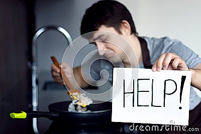 Loser bachelor on modern kitchen concept Stock Photo