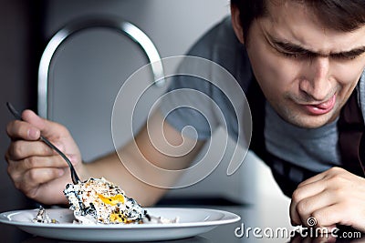 Loser bachelor on modern kitchen concept Stock Photo