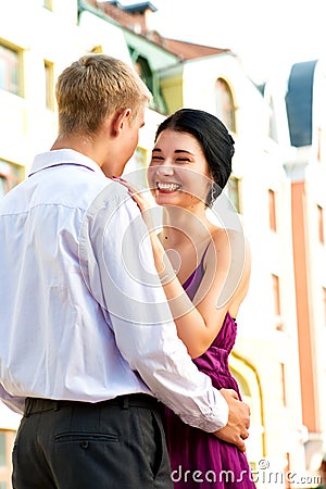 Young loughing couple on street Stock Photo