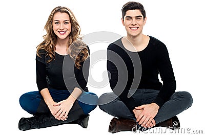 Young love couple sitting on the floor Stock Photo