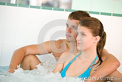 Young loving couple enjoy whirlpool bath Stock Photo