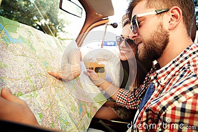 Young loving couple planning their romantic adventure Stock Photo