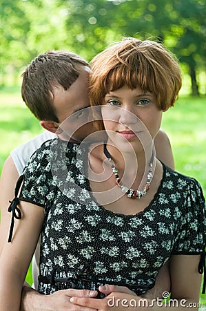 Young loving kissing couple teens Stock Photo