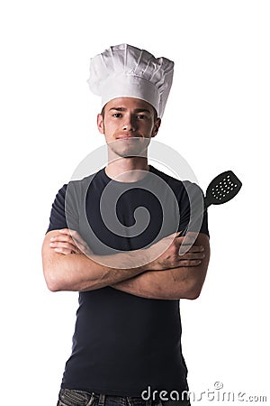 Young Male Chef in Black Shirt and White Hat Stock Photo