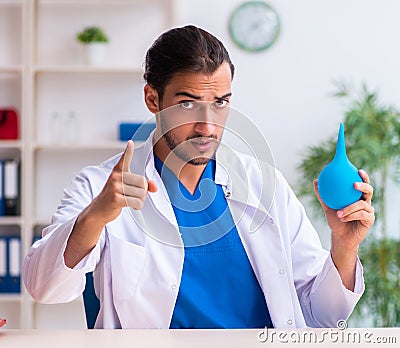 Young male doctor gastroenterologist working in the clinic Stock Photo