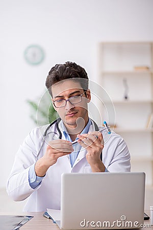 Young male doctor neurologist working in the clinic Stock Photo