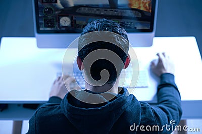 Young male gamer passing level Stock Photo