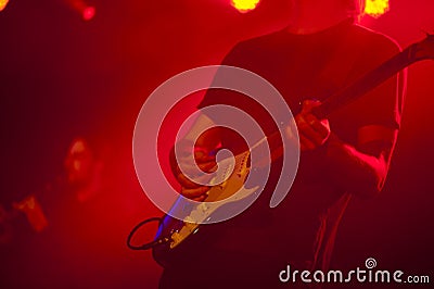 Young male guitarist at concert Stock Photo