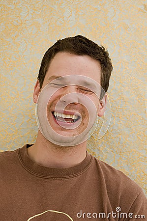 Young Male Laughing Stock Photo