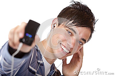 Young male listening mp3 music and shows player Stock Photo