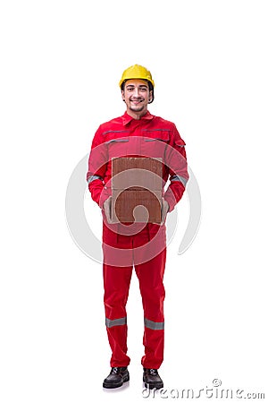 Young male mason with brick isolated on white Stock Photo