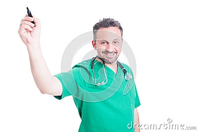 Young male medic or doctor writing on blank glass Stock Photo