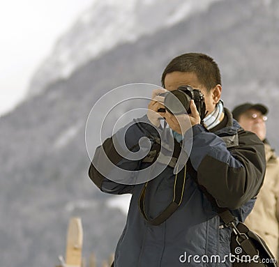 Young male photographer Stock Photo