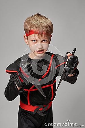 Little fighter with kunai Stock Photo