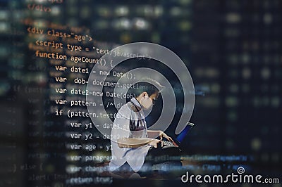 Young male student in uniform sitting and coding for web development. HTML web developer. Stock Photo