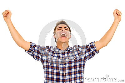 Young man with arms raised Stock Photo