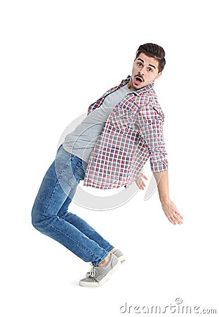 Young man attracted to magnet Stock Photo