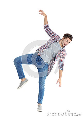 Young man attracted to magnet on white Stock Photo