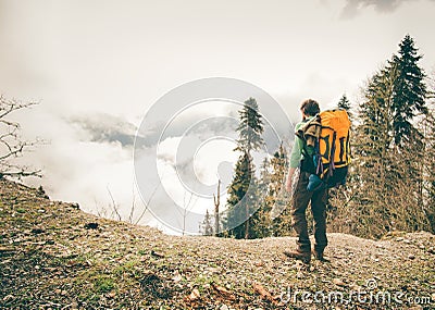 Young Man with backpack relaxing outdoor Stock Photo