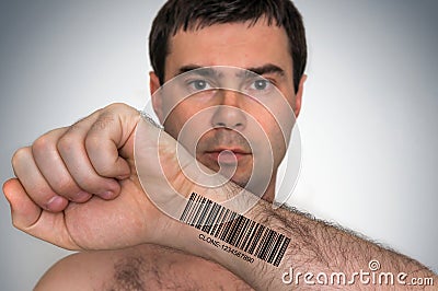 Man with barcode on his hand - genetic clone concept Stock Photo