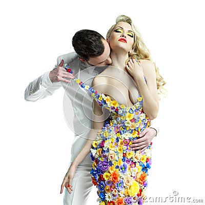 Young man and beautiful lady in flower dress Stock Photo