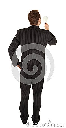 Young man in a black business suit and with a magn Stock Photo