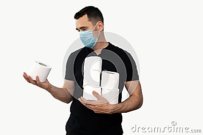 Man in a black t-shirt with a blue medical mask and toilet paper on an isolated white background Stock Photo