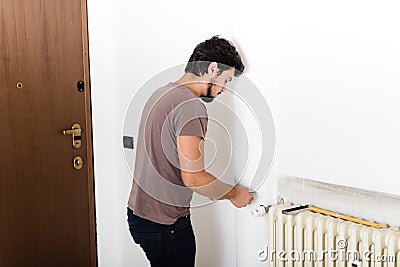 Young man bricolage working Stock Photo