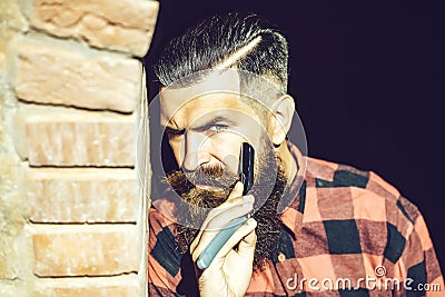 Hipster cutting with razor Stock Photo