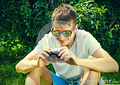 Young Man with a Camera Stock Photo