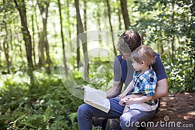 Young man and child worship Stock Photo