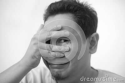 Young Man Cried Expression, Covering His Face Stock Photo