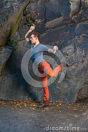 Young Man Dancing Outside Stock Photo