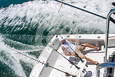 Young man in deep sea fishing boat off Key West Florida USA circa July 2010 Editorial Stock Photo