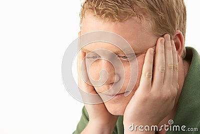 Young man deep in thought Stock Photo