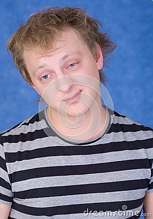 Young man with dishevelled hair Stock Photo