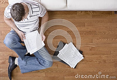 Young Man Doing Taxes Stock Photo