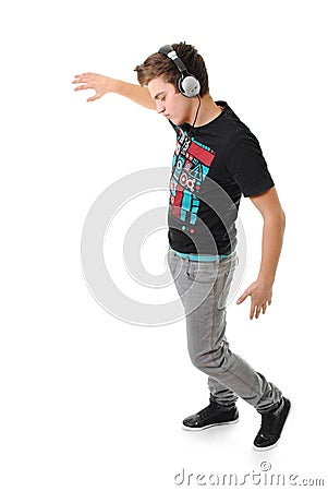 Young man enjoying music isolated Stock Photo