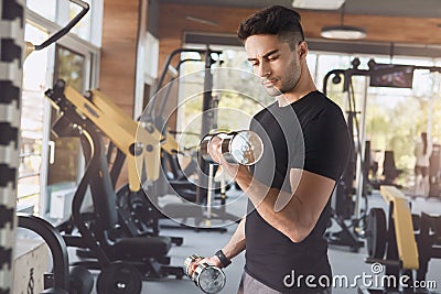 Young man exercise in the gym healthy lifestyle Stock Photo