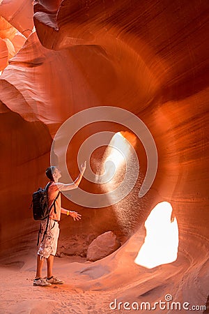 Young man exploring Antelope Canyon in the Navajo Reservation Stock Photo