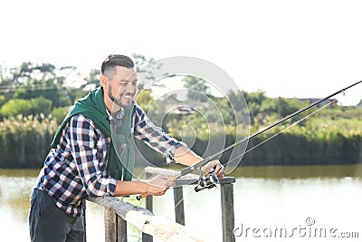 Young man fishing alone Stock Photo