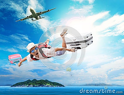 Young man flying from passenger plane to natural destination isl Stock Photo