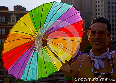 Gay Pride Festival and Rainbow Umbrella Editorial Stock Photo