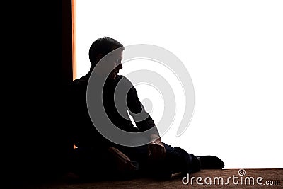 Young man with grief dropped his arms Stock Photo